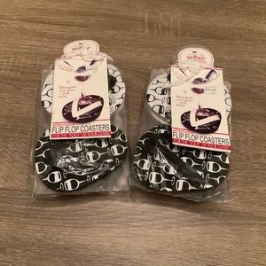 2 sets of  4 wine glass coasters/tags- flip flop design

Black and white